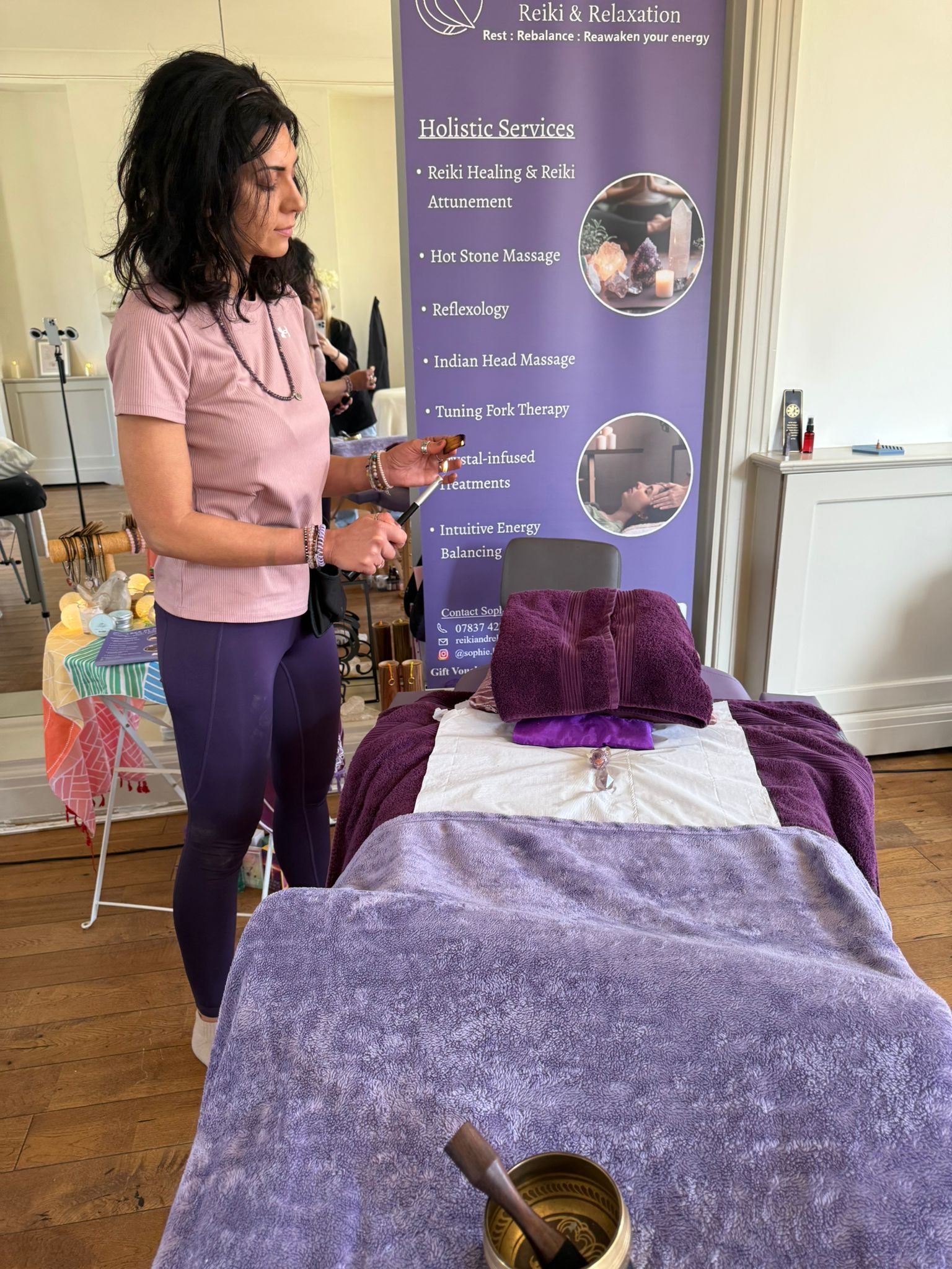The treatment table at R&R by Sophie, laid with warm towels ready for a session